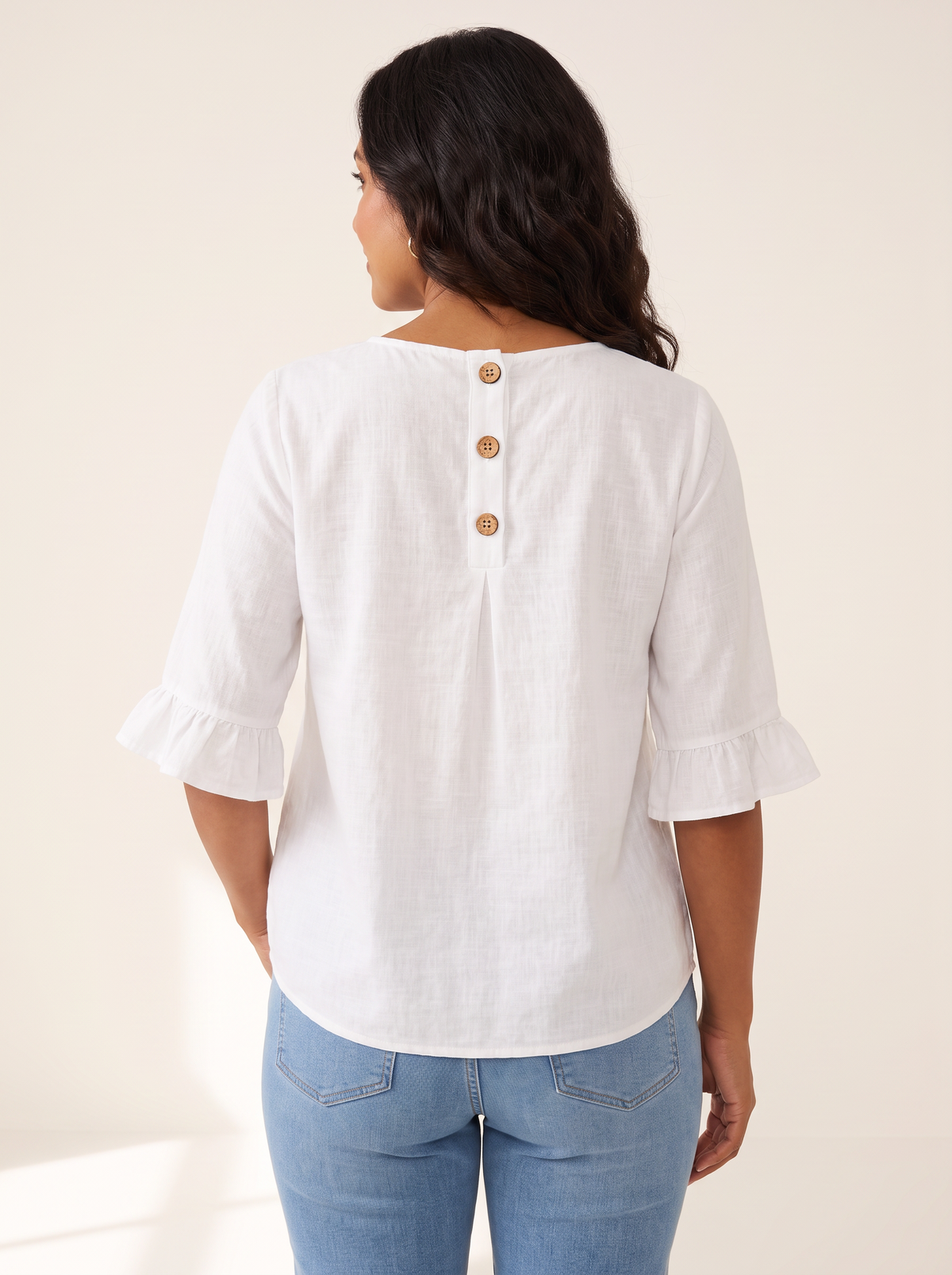 Jessara White top back view