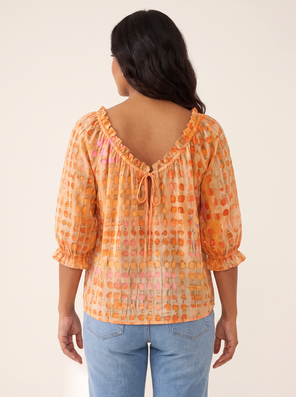 Candice Orange top back view