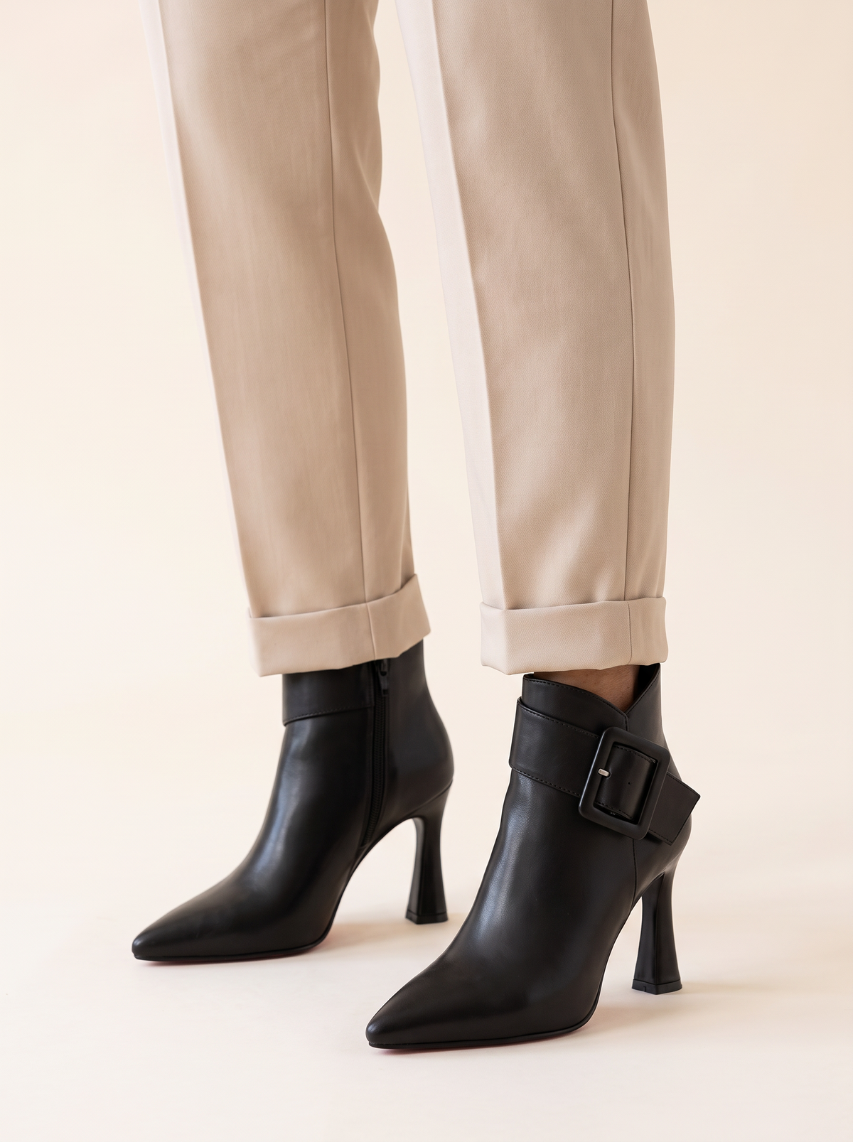 Emilie buckle ankle boots in black, front view