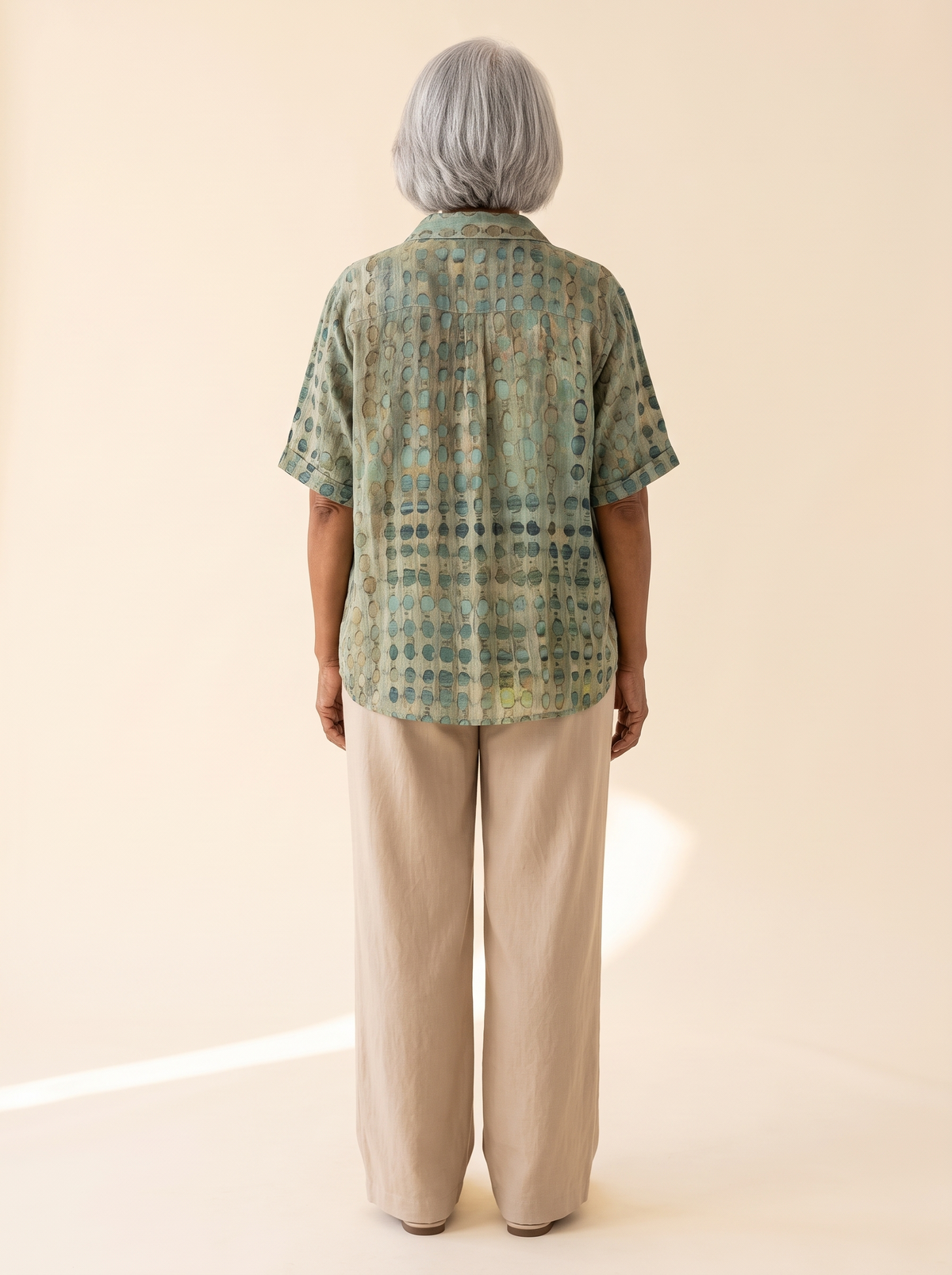 Melody relaxed comfort top in green, back view